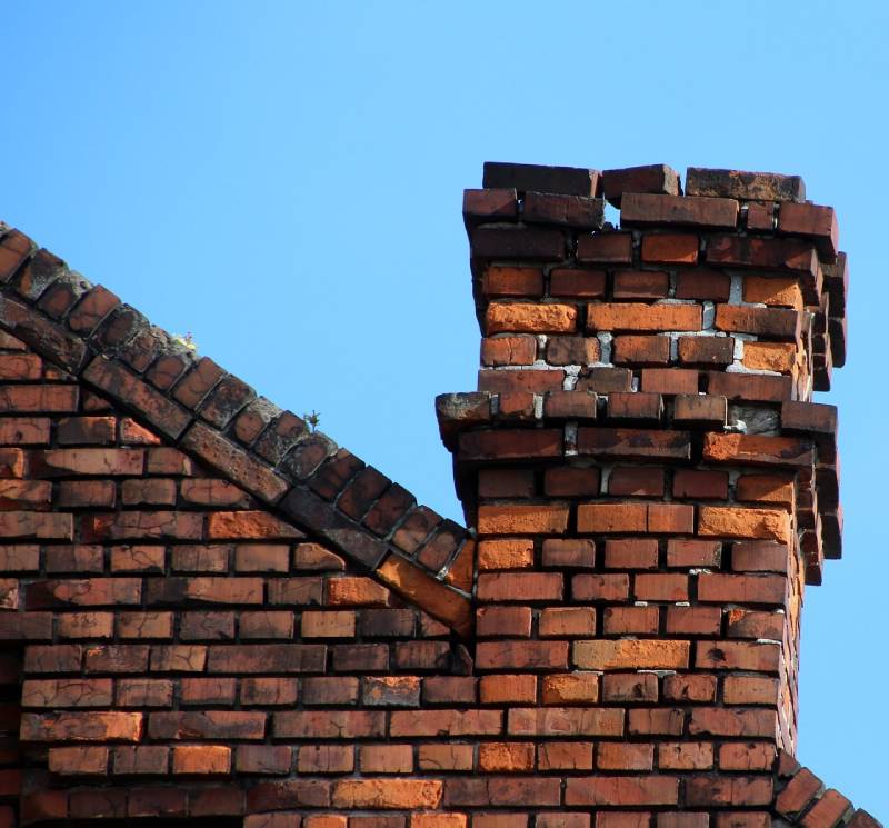 Signs Your Burbank Home Needs a Chimney Inspection Damaged chimney on an Burbank home showing cracks and missing mortar
